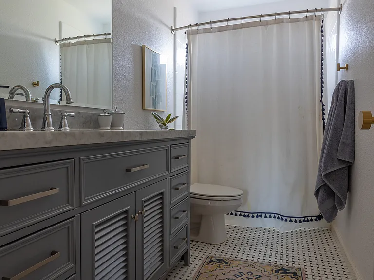 Upstairs bathroom with Tub shower