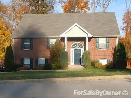 Two store split level : Walk in the front door to go up to the living area or down to the den.