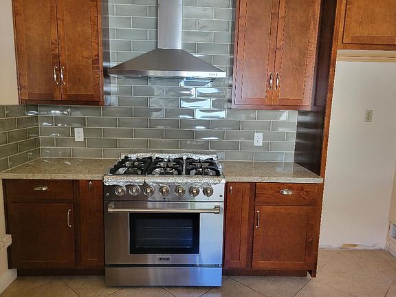 Remodeled kitchen with stove/hood