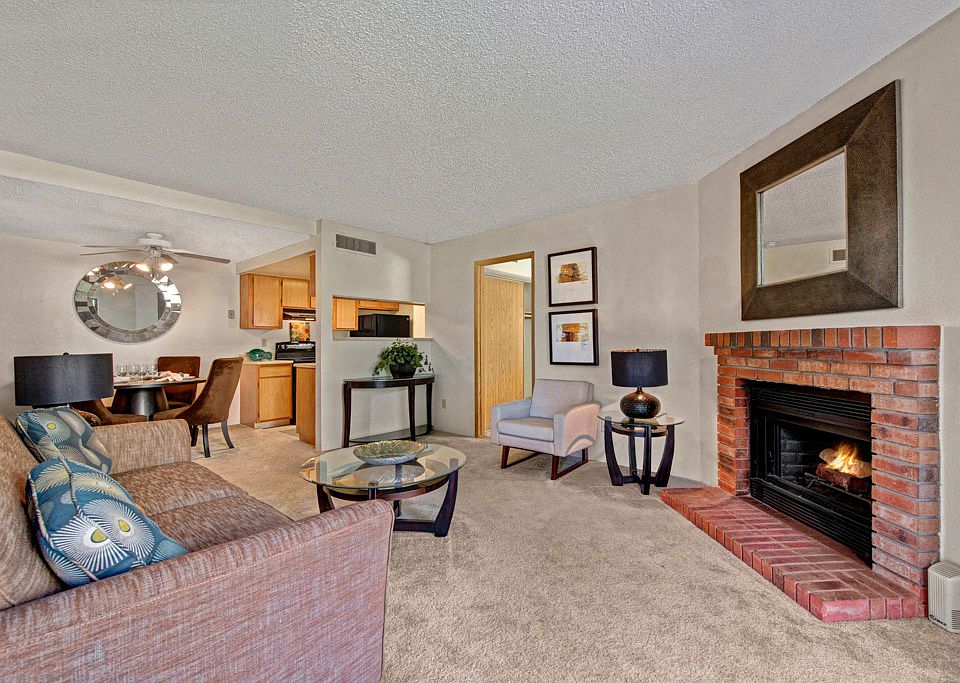 Grand View Furnished Living Room with Fireplace