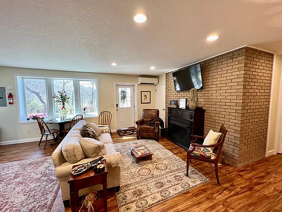 Cozy Living Room Area with Gas Logs