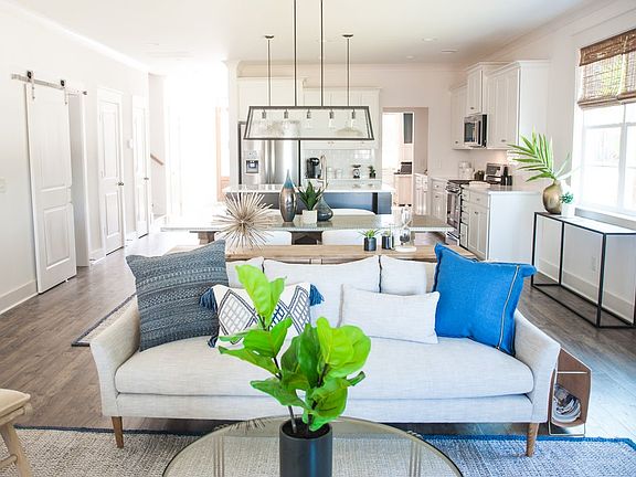 Photos are of a similar home