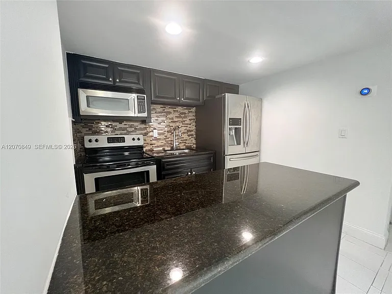 4301 NW South Tamiami Canal Dr #3-314 — Photo 1