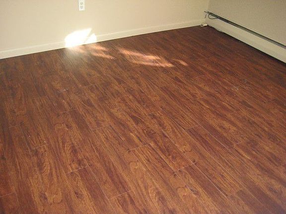 Laminate flooring throughout