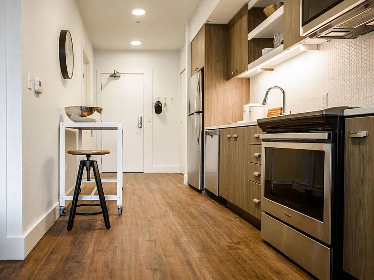 The George Besaw Apartments Kitchen Cabinets and Stove