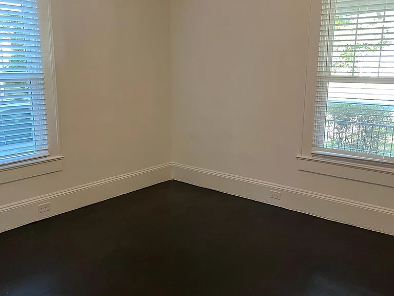 Second bedroom to the left of the bathroom.