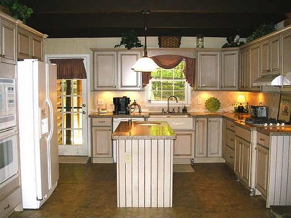 New kitchen with Silestone counters, new appliances, and lots of cabinets.  