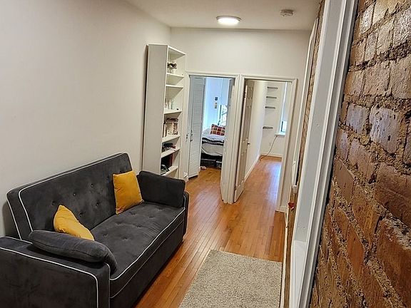 5th image of 312 E 9th St APT 6