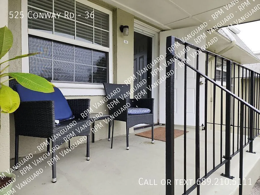 Second Floor Condo Unit with Balcony and Pool View — Photo 2