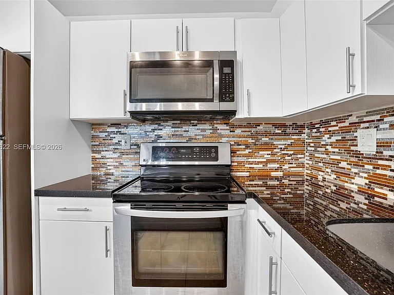 9920 NW 68th Pl #110 — Photo 13