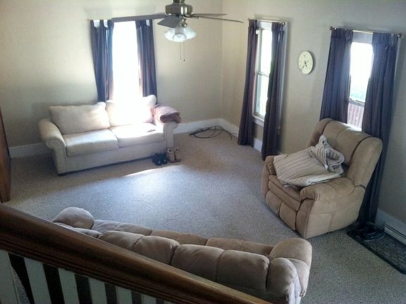 Living room boasts four large windows!