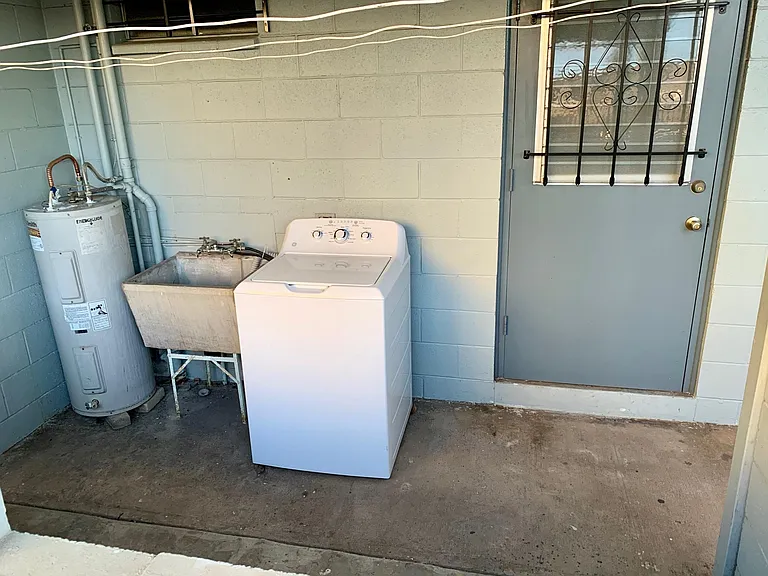 In unit laundry machine and sink.