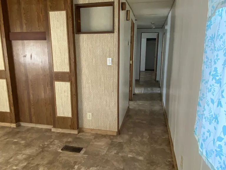 Hallway to bedrooms, bath and laundry.