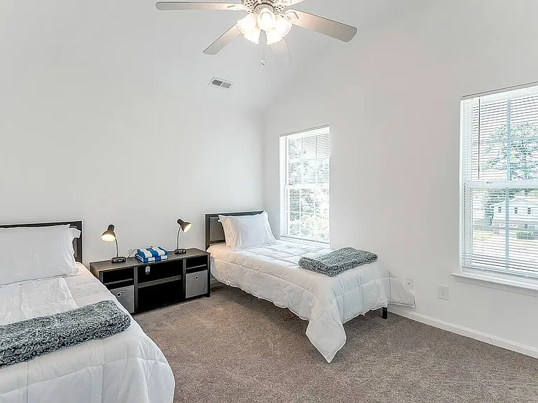 Bedroom 3: Two twin beds, perfect for those with kiddos or extra family members staying.