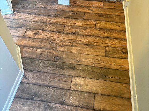 Entry way with new hardwood barn wood floors