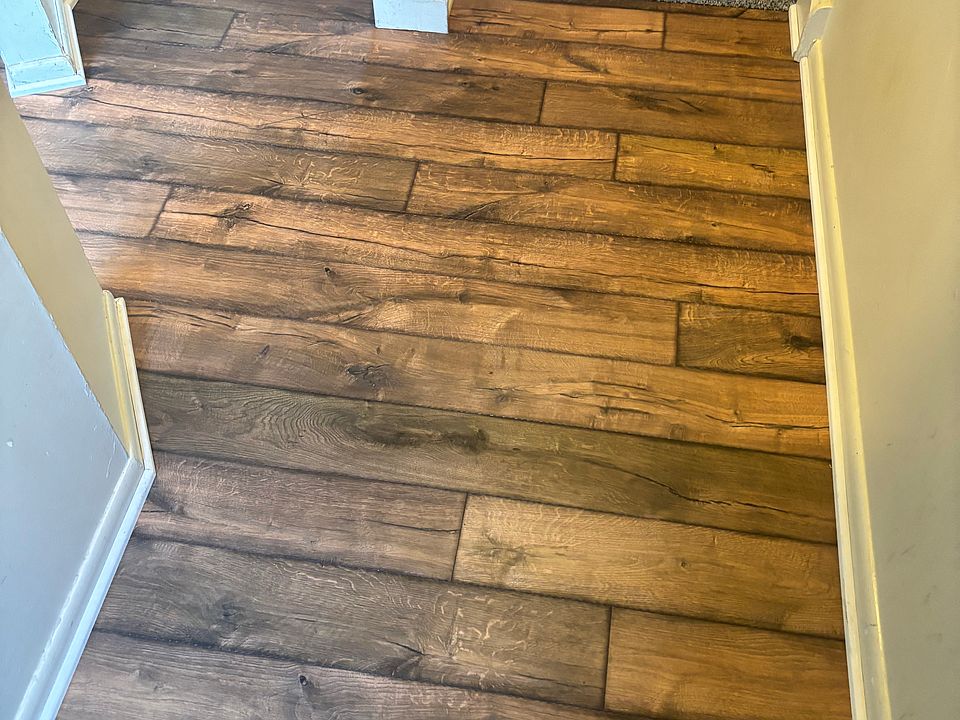 Entry way with new hardwood barn wood floors