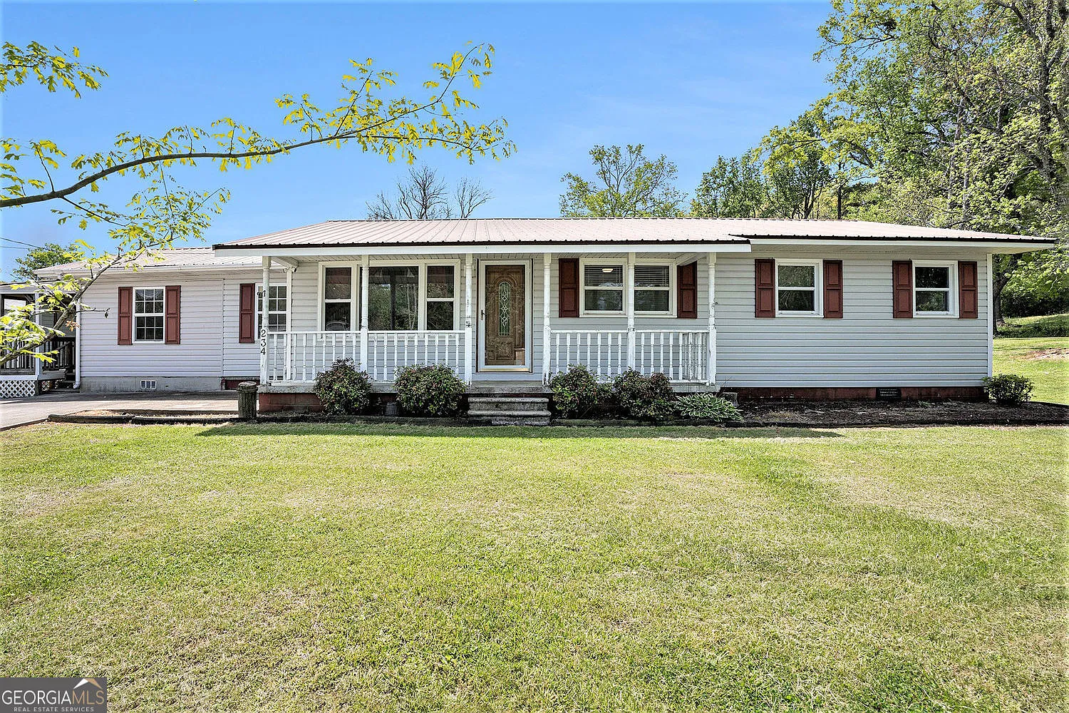 234 NE Oakman Rd photo 1