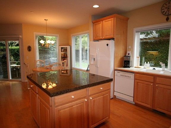 Granite, buffet-sized kitchen island.
