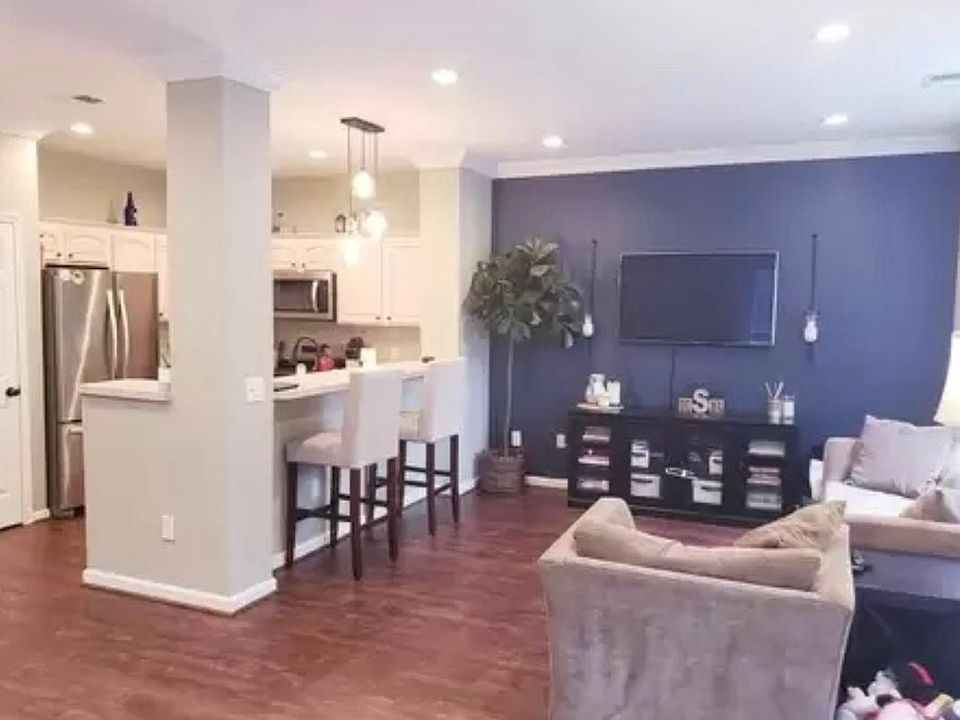 Open concept living room, dining room, kitchen on first floor