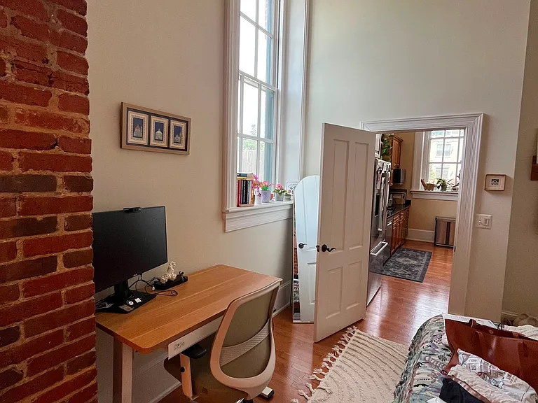 Master Suite with the beginning of exposed wall and space for bureau or desk, as shown.