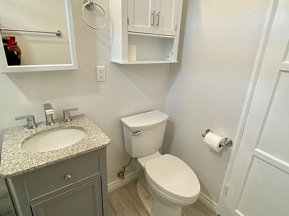 All new toilet, vanity, storage and flooring
