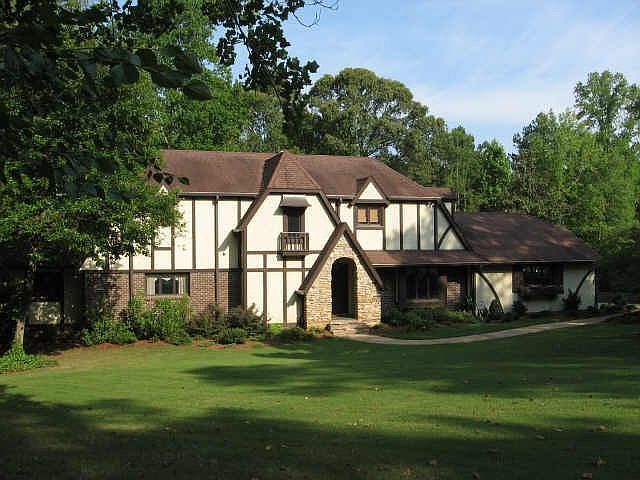 Custom built Tudor Style home on Estate lot