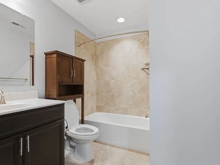 1st-floor bedroom with full bathroom