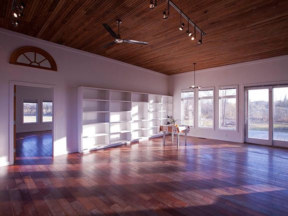 living room and door to master bedroom