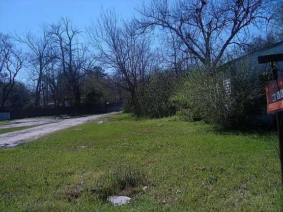 LOT ADJACENT TO HOUSE