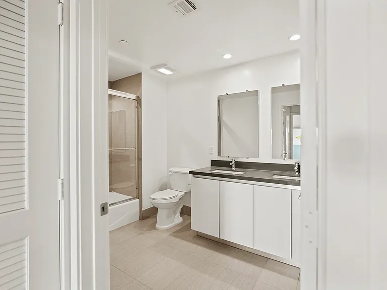 Bathroom with Double-Sink Vanity and Bathtub