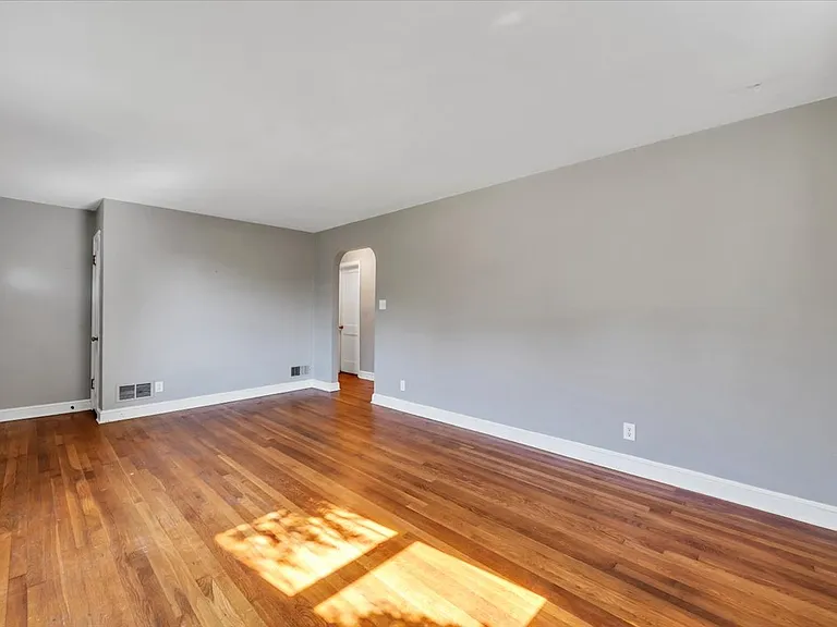 Spacious Living Room w/ Coat Closet and Hardwood Floors!