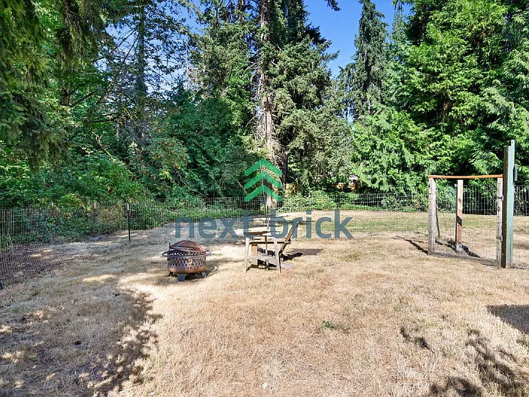528 NE Serpentine Pl — Photo 16