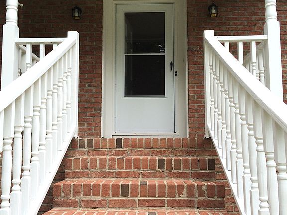 Brick home with showstopper front steps