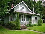 Cute house included in sale.
