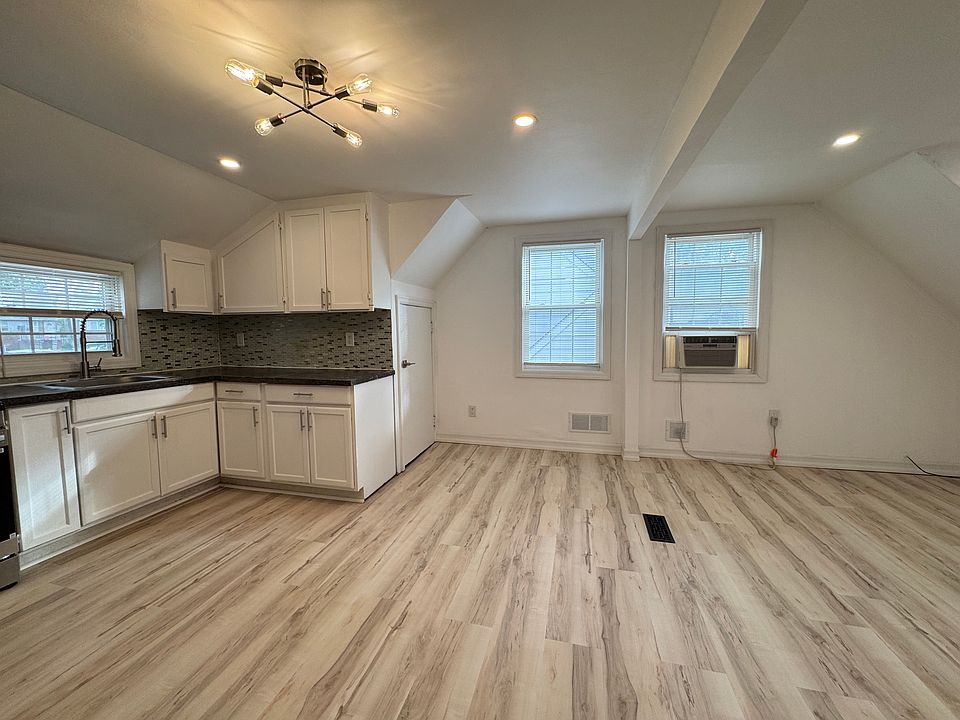 VIEW FROM ENTERANCE ;OPEN KITCHEN AND LIVING ROOM