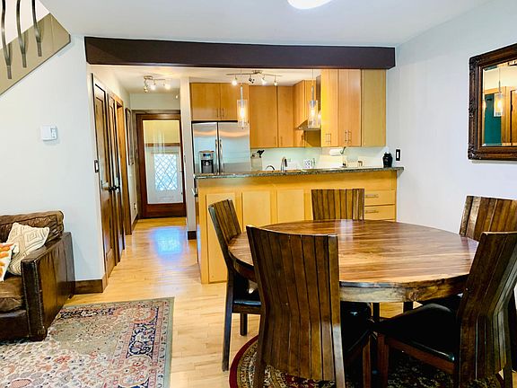 Dining, kitchen and front entry