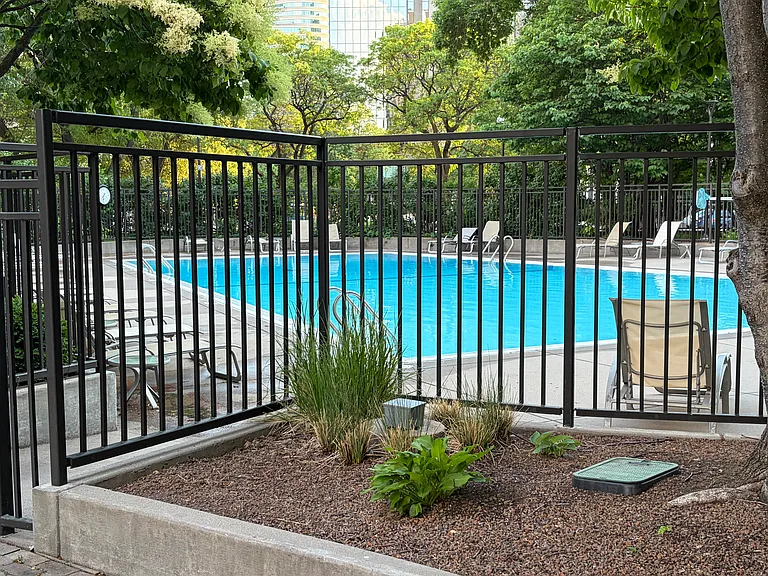 Spacious outdoor pool and surrounding patio to enjoy