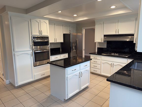 Kitchen with newly refinished cabinets