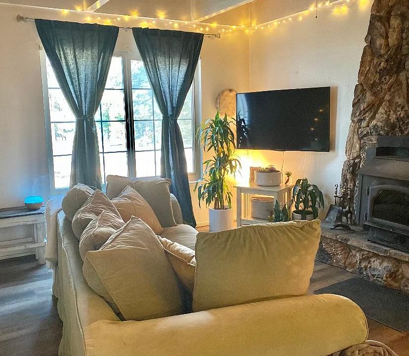 Living room furnished by current tenants.