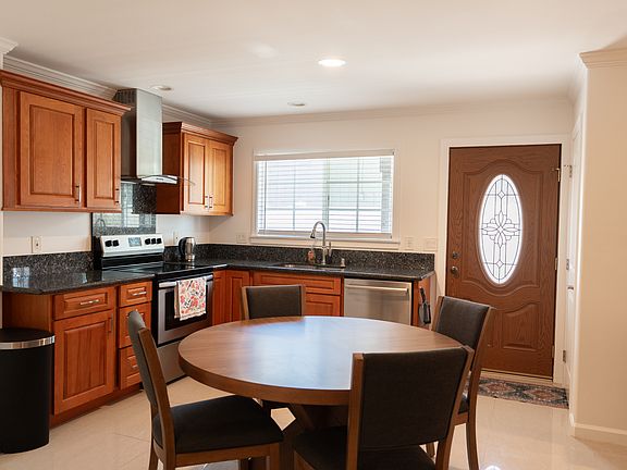 Kitchen and Dining table at entry