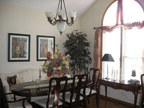 Dining Rm with palladian window which brings loads of light into the home.   
