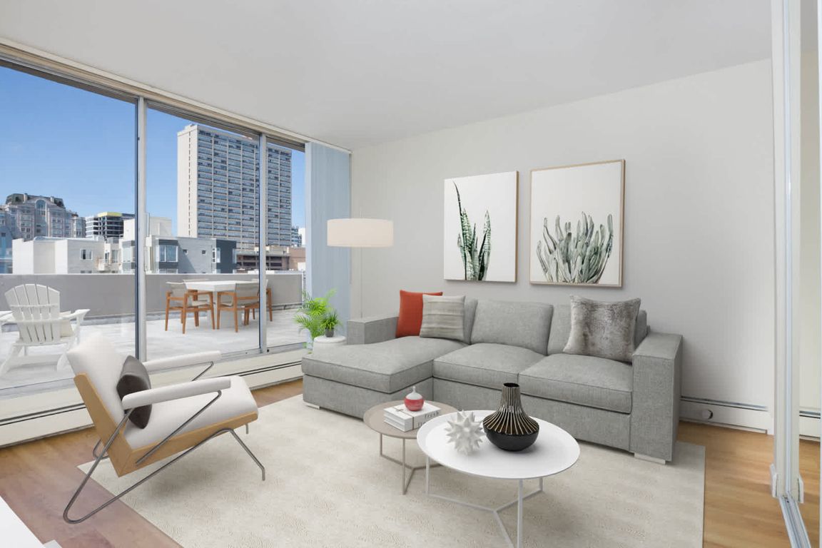 Living Room with Oak Flooring and Outdoor Space
