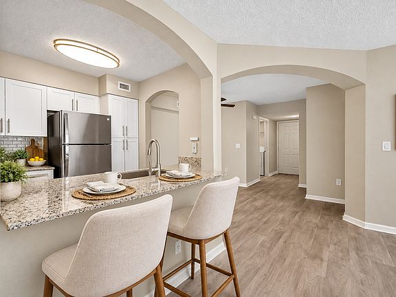 Step into the elegance of Mosaic. This beautifully designed kitchen boasts modern appliances, an open layout, and stylish finishes. Perfect for culinary enthusiasts and entertaining alike. Schedule your tour today and elevate your living!
