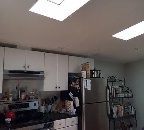 Two Skylights in the kitchen with island