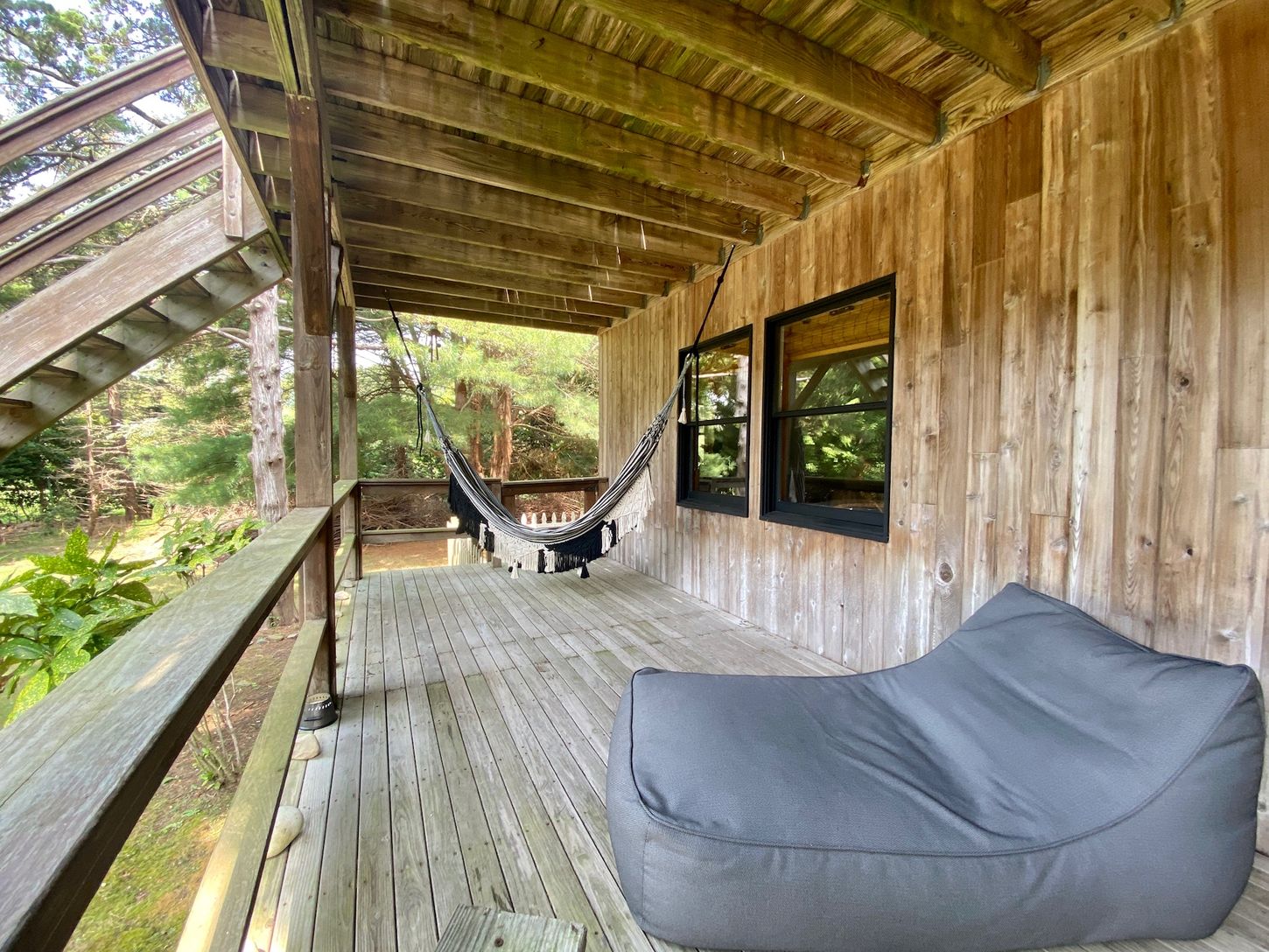 Downstairs Deck with Hammock and Seating Area