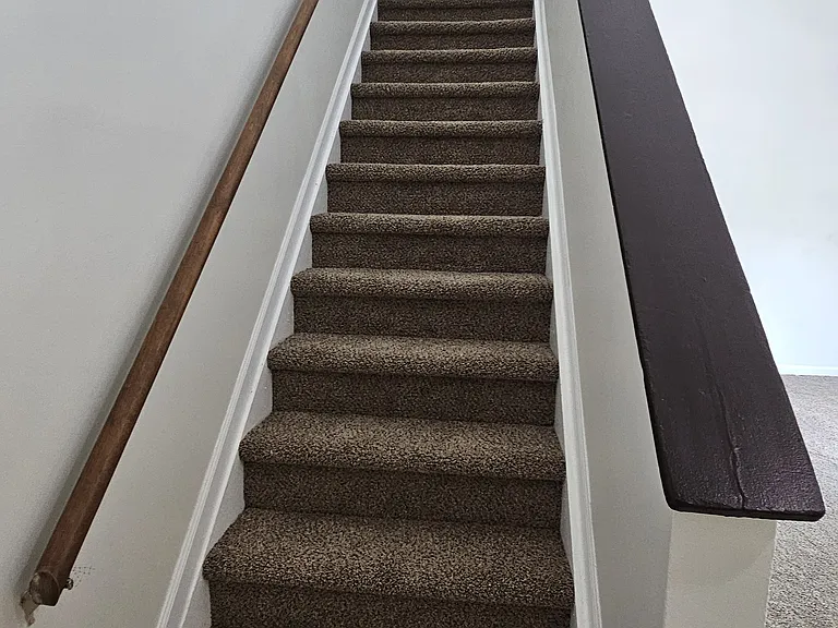 Stairs leading to master suite
