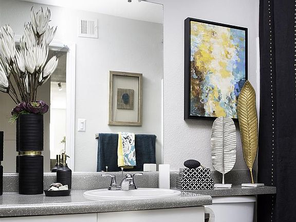Updated bathrooms feature refreshed counter tops and new fix