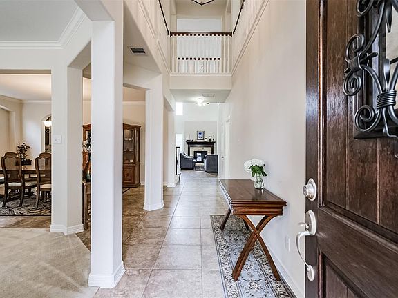 This is a gorgeous entry with 19 foot ceilings