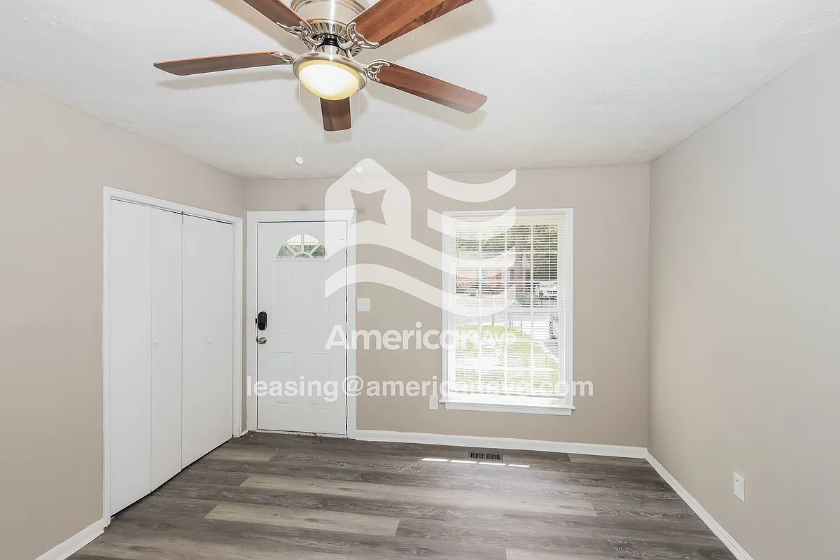 1825287_002_wm_-_living_room_13187295.jpg - 3266 Lancing Ln