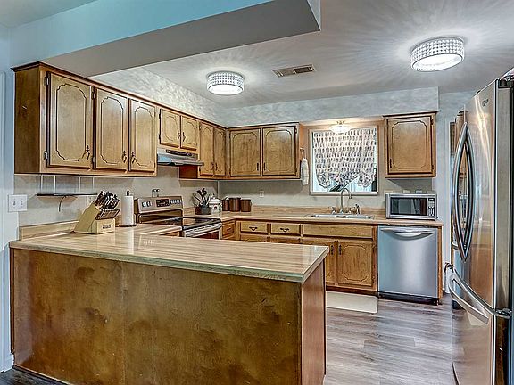 4th image of 9030 S Wilderwood Ln